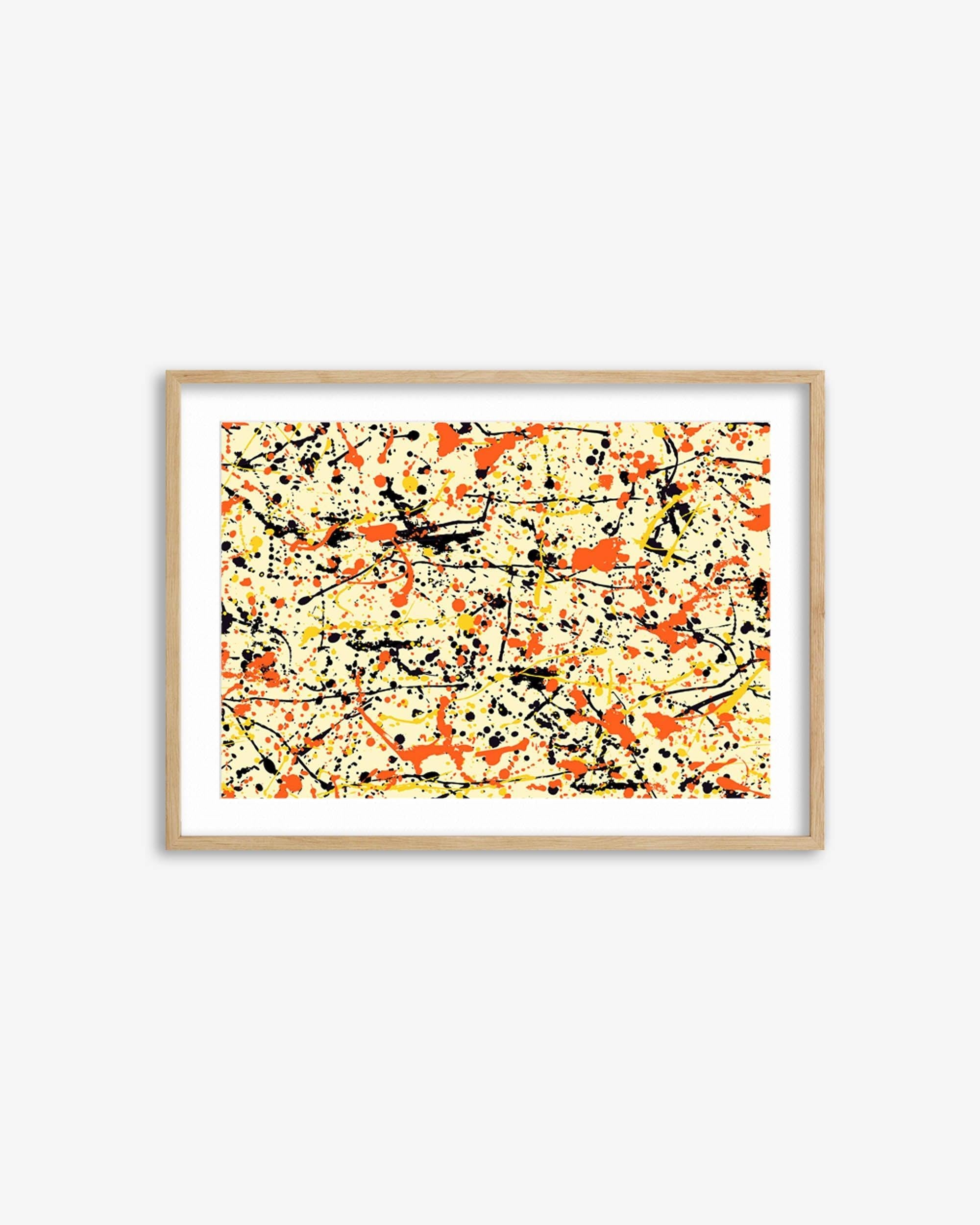 Framed abstract artwork with splashes of orange, yellow, and black on a white background