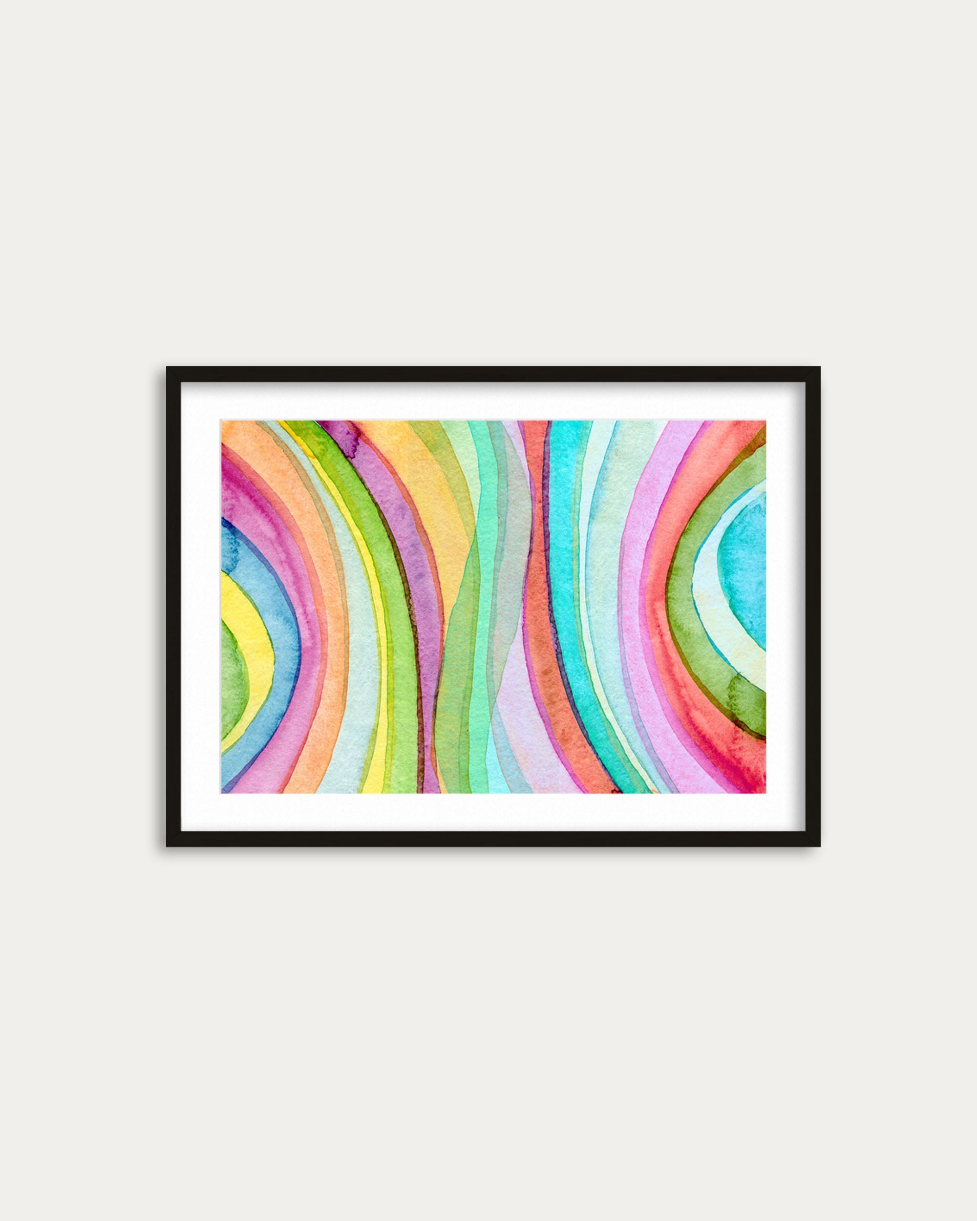 Framed abstract artwork with colorful wavy pattern on a white wall