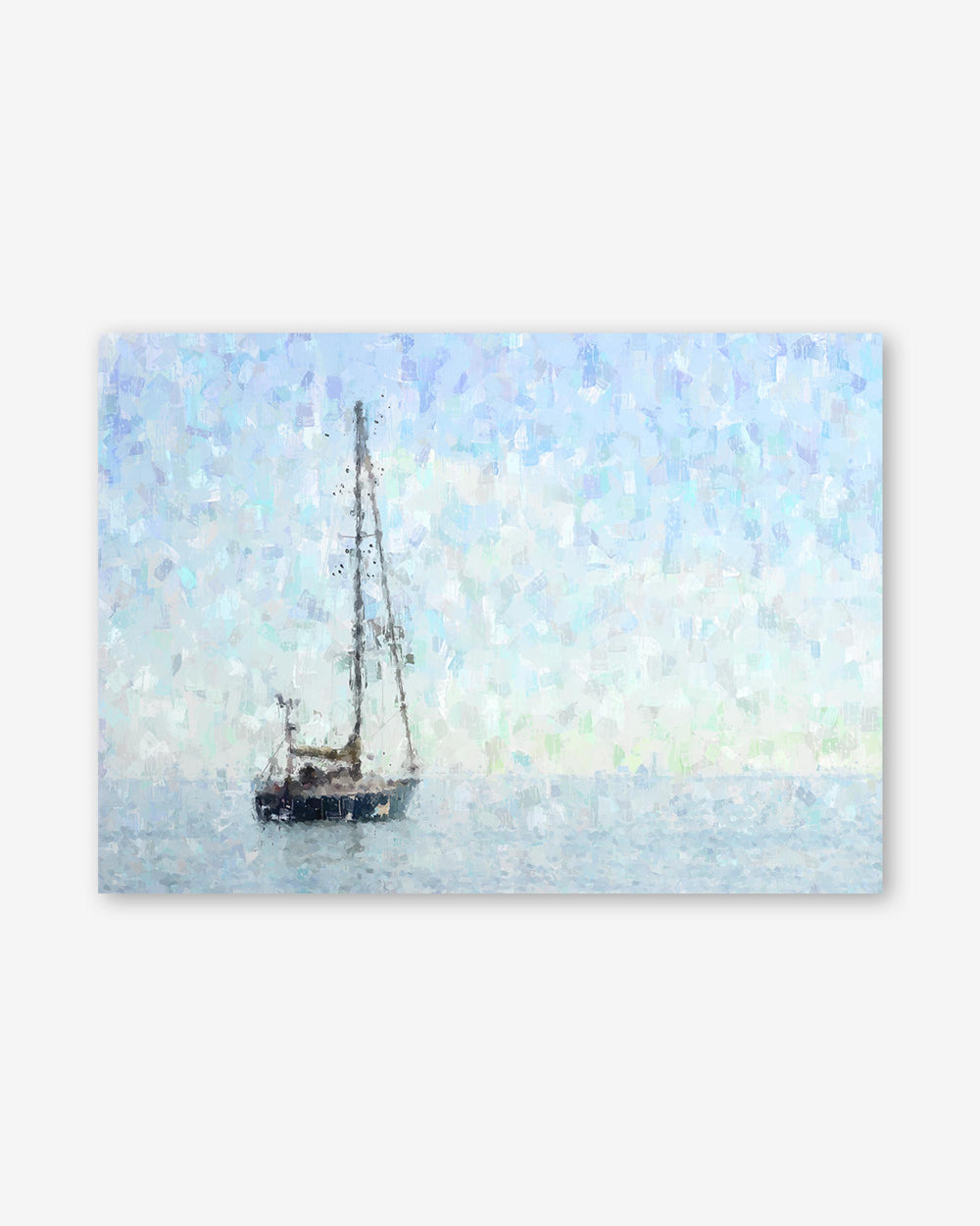 Sailboat on water with a light blue sky