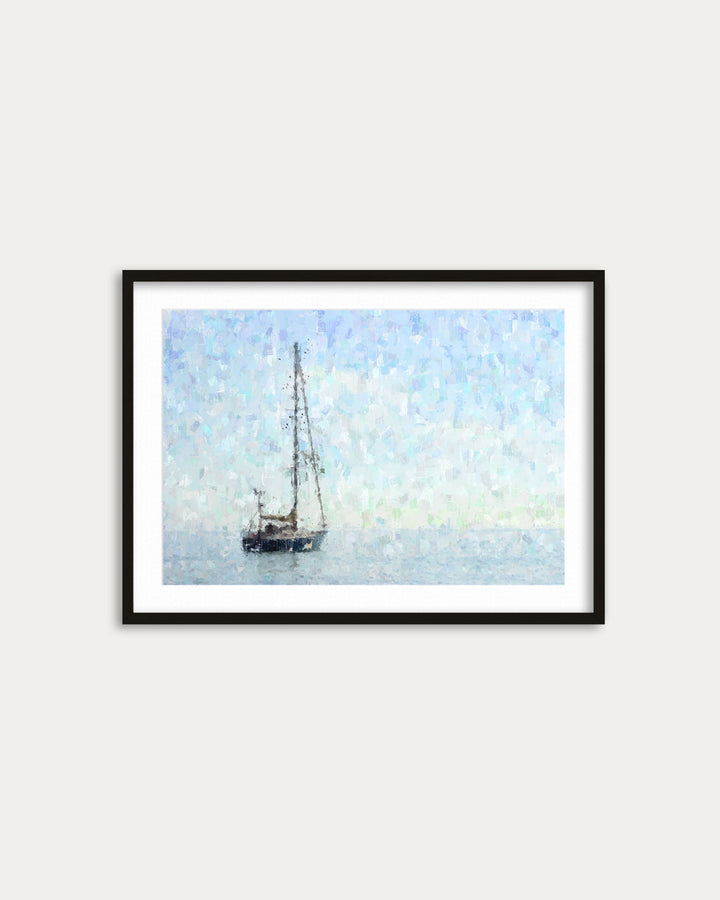 Framed artwork of a sailboat on water with a light blue sky.