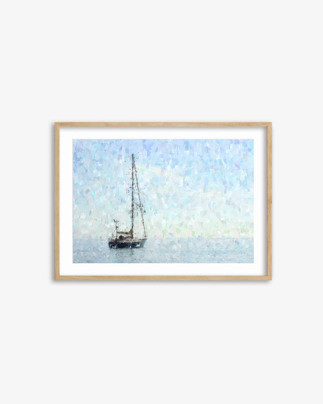 Framed artwork of a sailboat on water with a light blue sky.