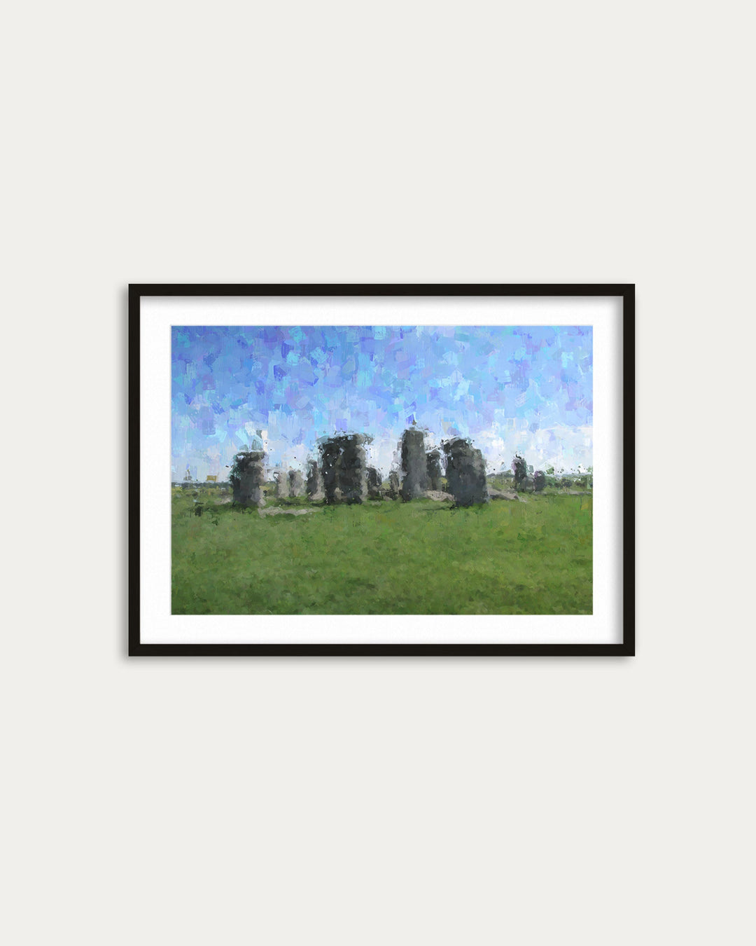 Framed artwork of Stonehenge on a white wall
