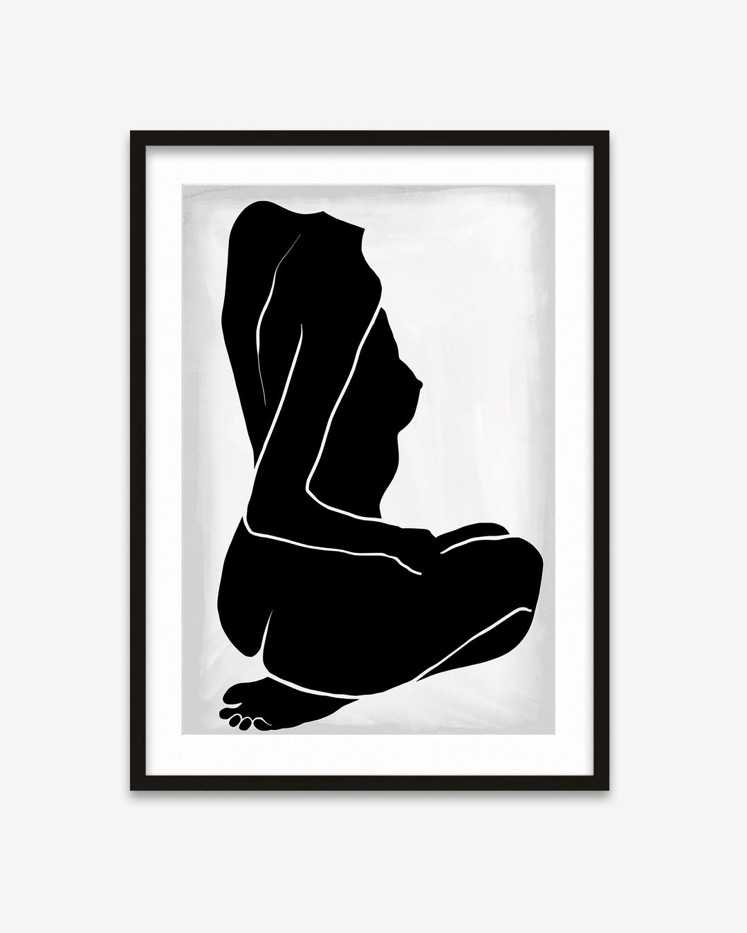 Framed black and white silhouette art print of a sitting figure on a white background