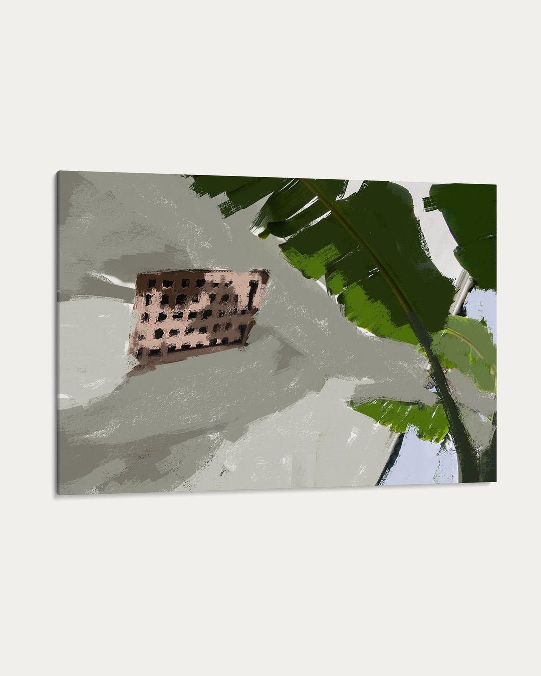 Decorative item on a textured surface with a banana leaf in the background