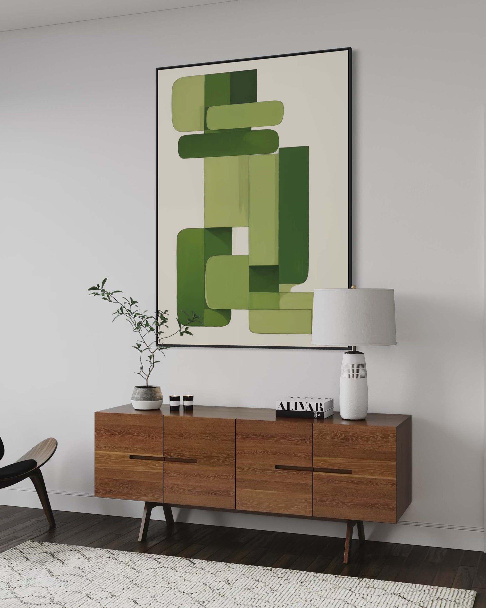 Modern room interior with wooden sideboard, abstract green art, and decorative items.