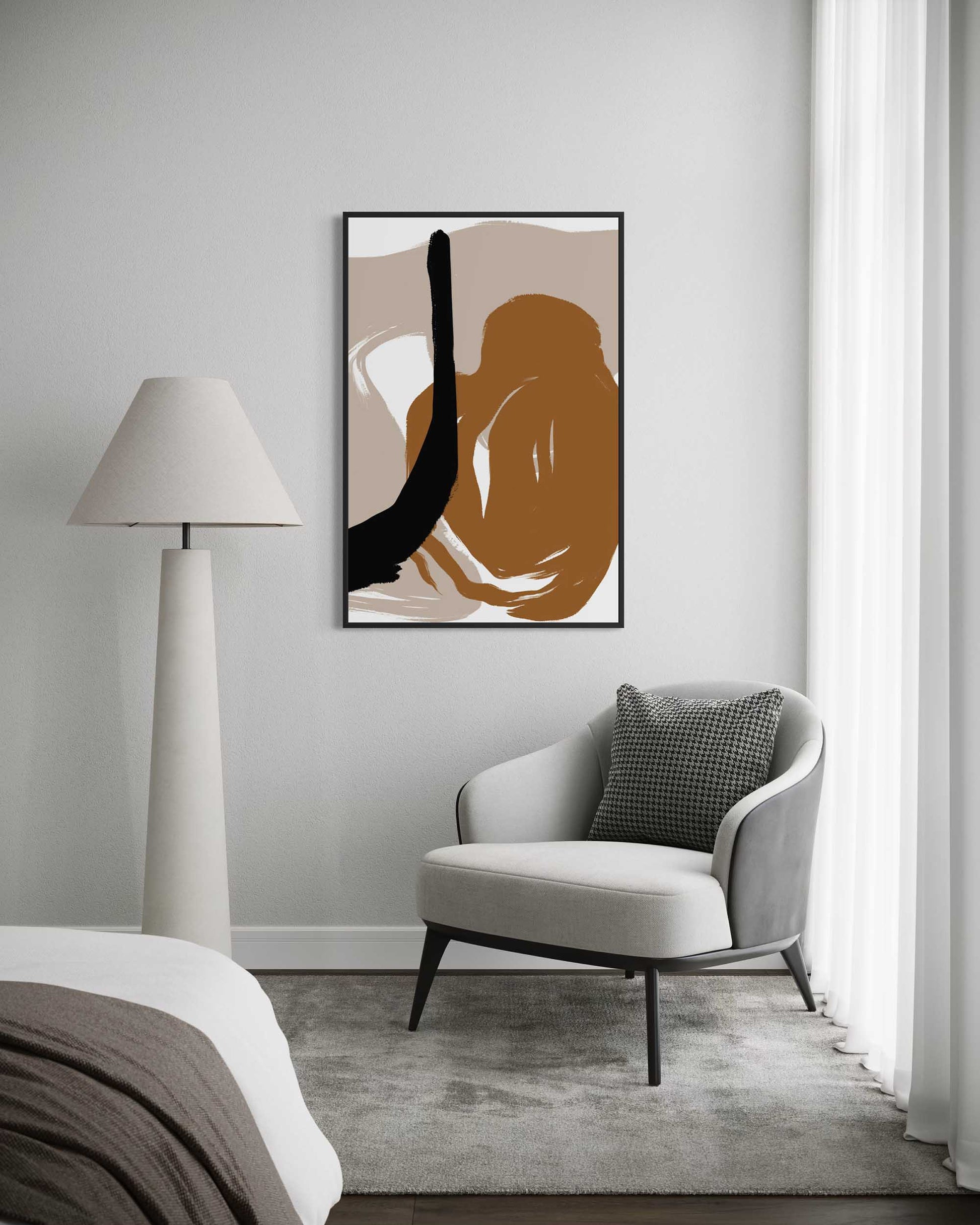 Modern interior with a gray armchair, abstract art, and floor lamp.