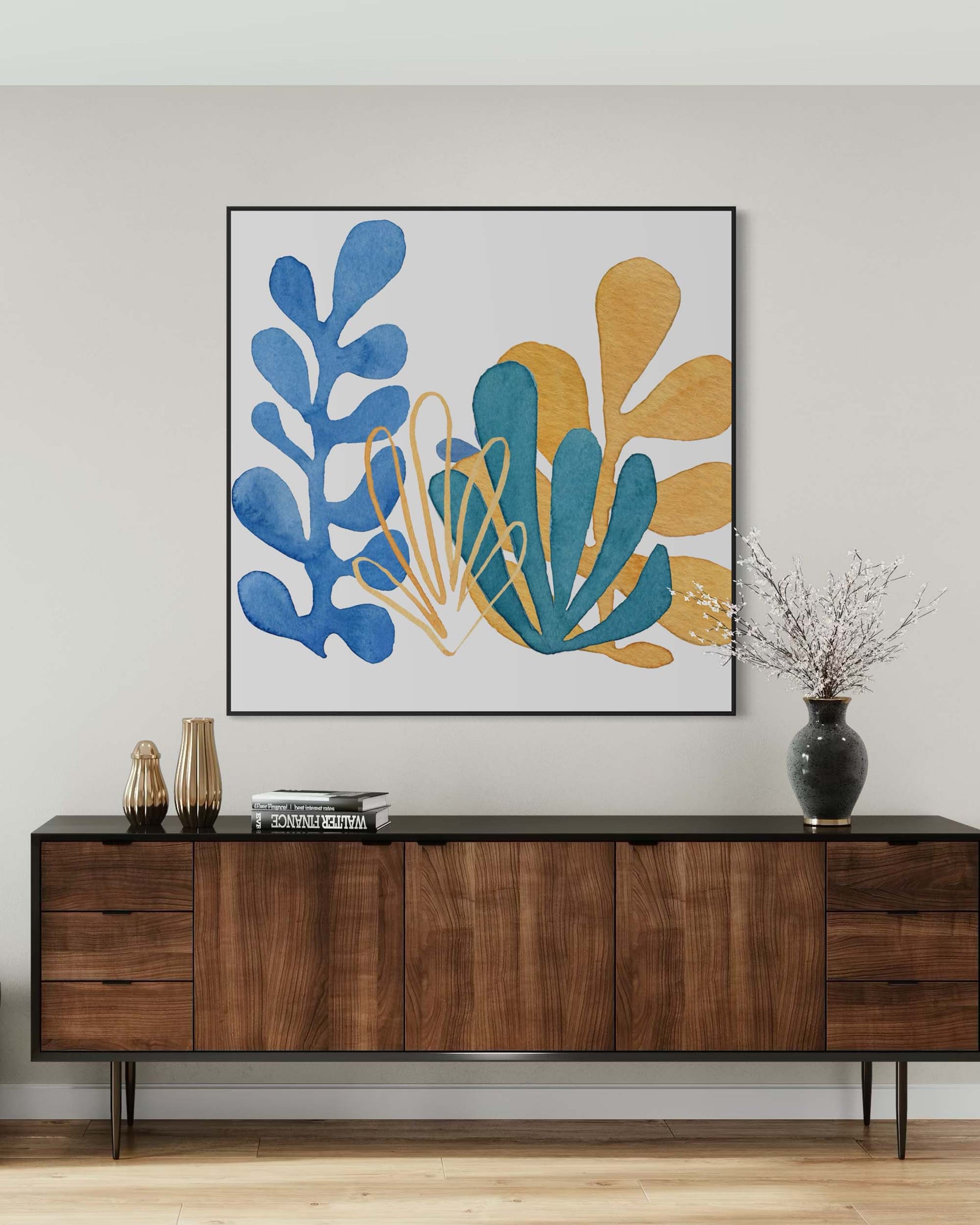 Wooden sideboard with decorative items and a colorful abstract painting on a wall.