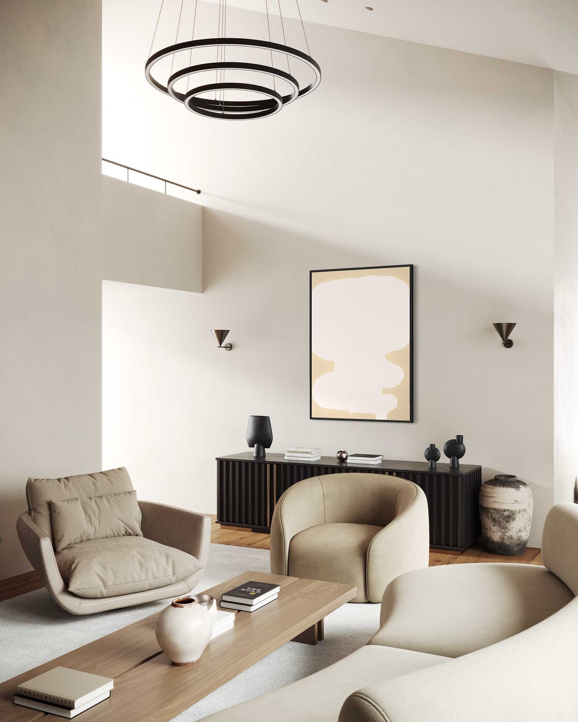 Modern living room with beige chairs, a coffee table, and decorative items.