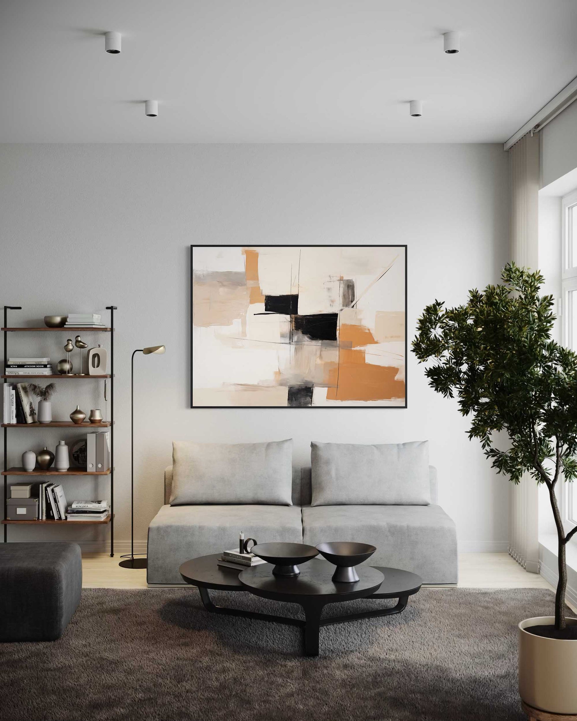 Modern living room with a gray sofa, coffee table, and abstract art on the wall.