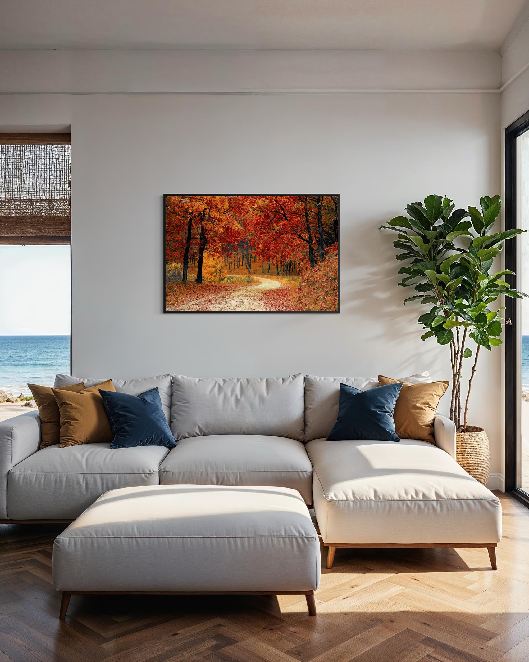 Living room with a gray sectional sofa, ottoman, and a painting of a forest scene on the wall.