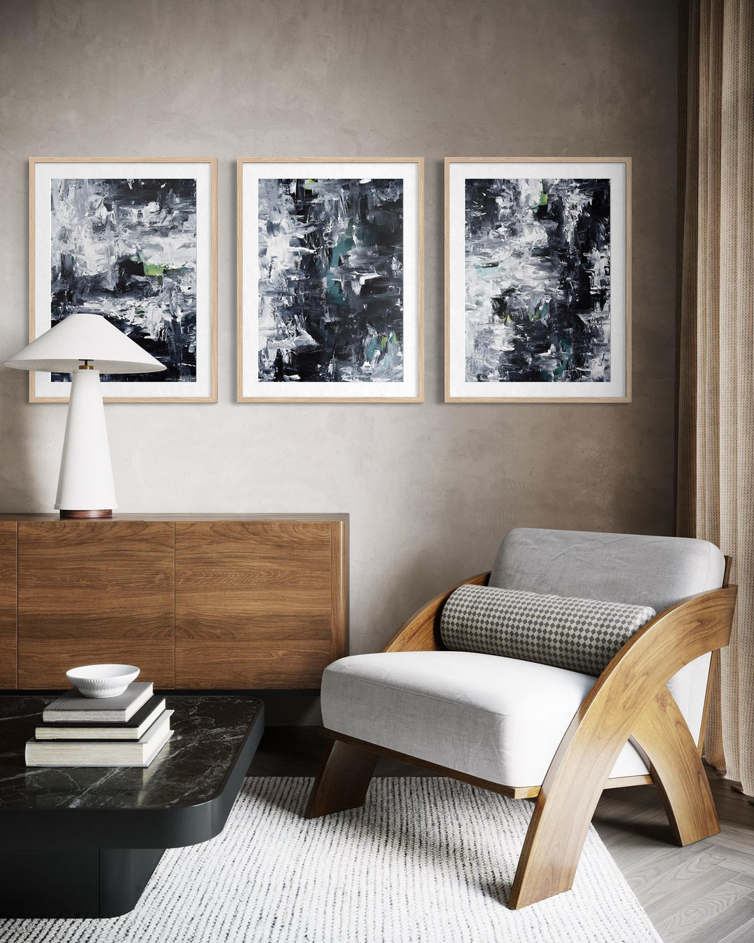 Modern living room with abstract art, wooden armchair, and coffee table.