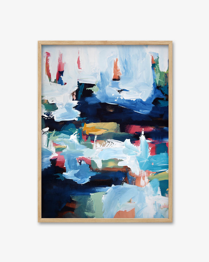Abstract painting with bold colors in a wooden frame on a white background