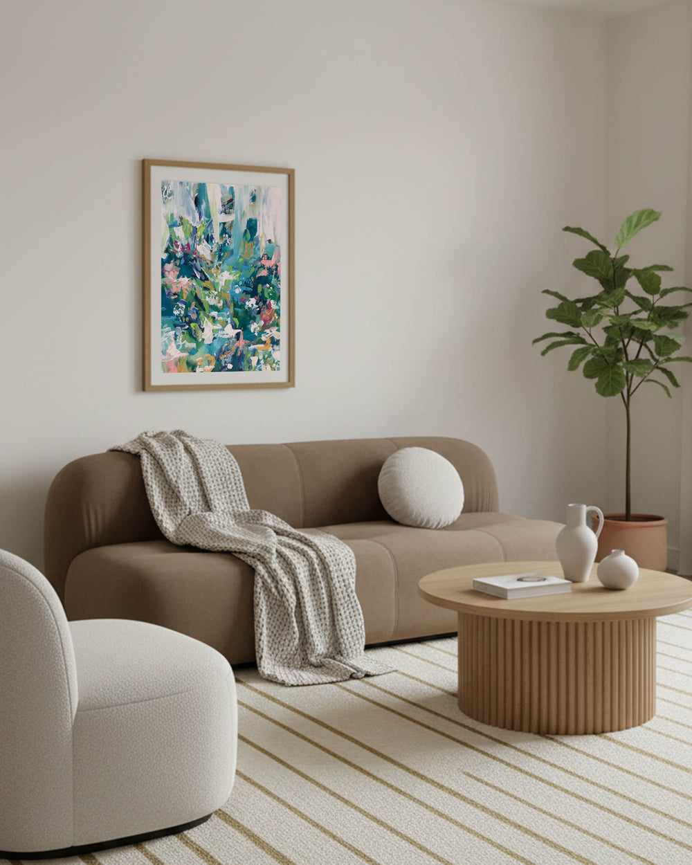 modern abstract colorful flowers framed in oak frame above brown japandi bubble sofa with beige occasion chair in scandi living room