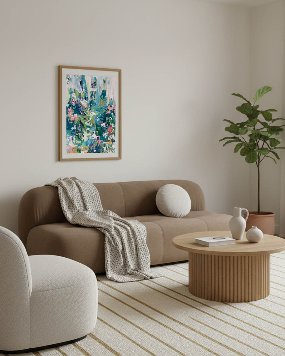 modern abstract colorful flowers framed in oak frame above brown japandi bubble sofa with beige occasion chair in scandi living room