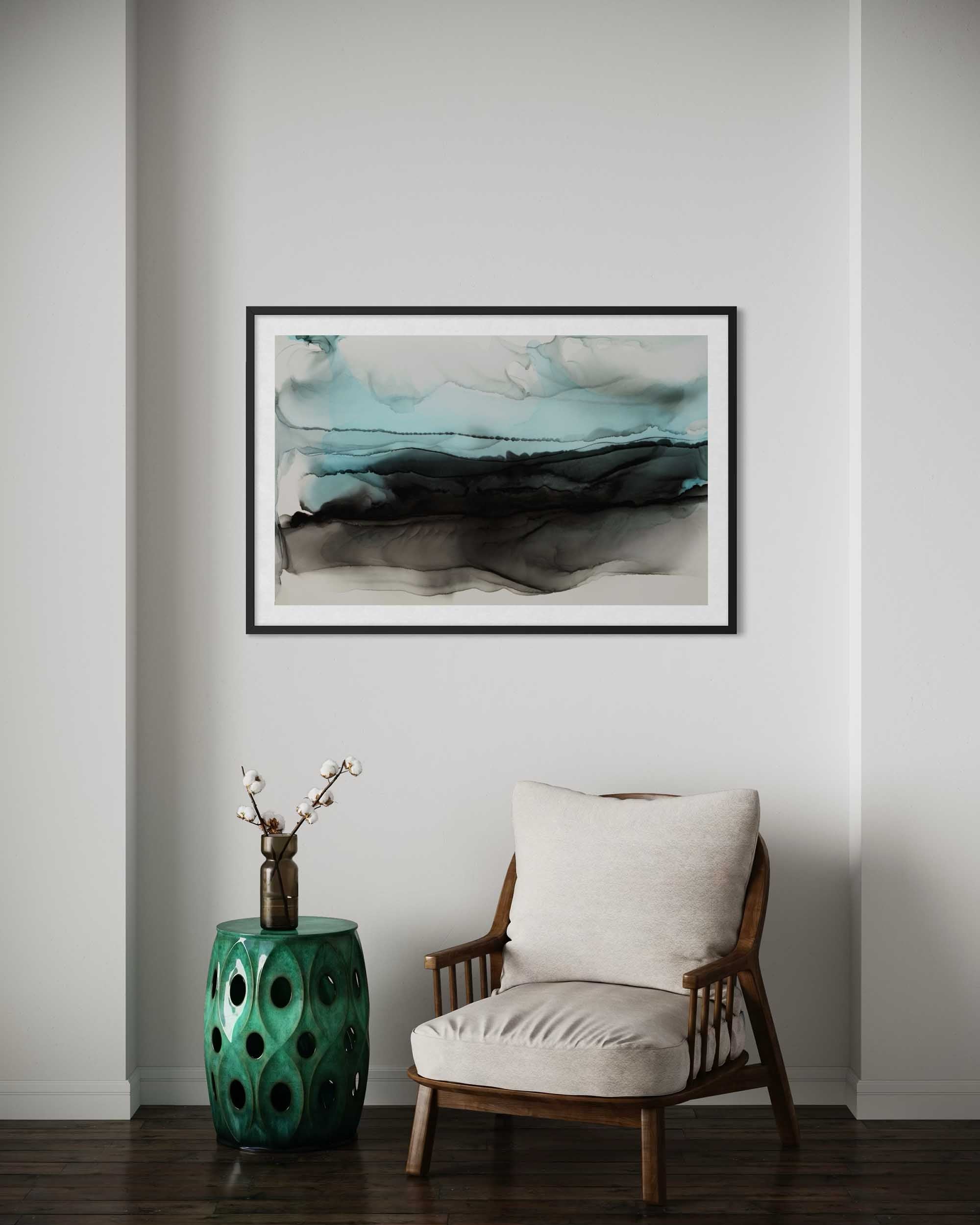 Modern interior with a framed abstract painting, green side table, and wooden chair.