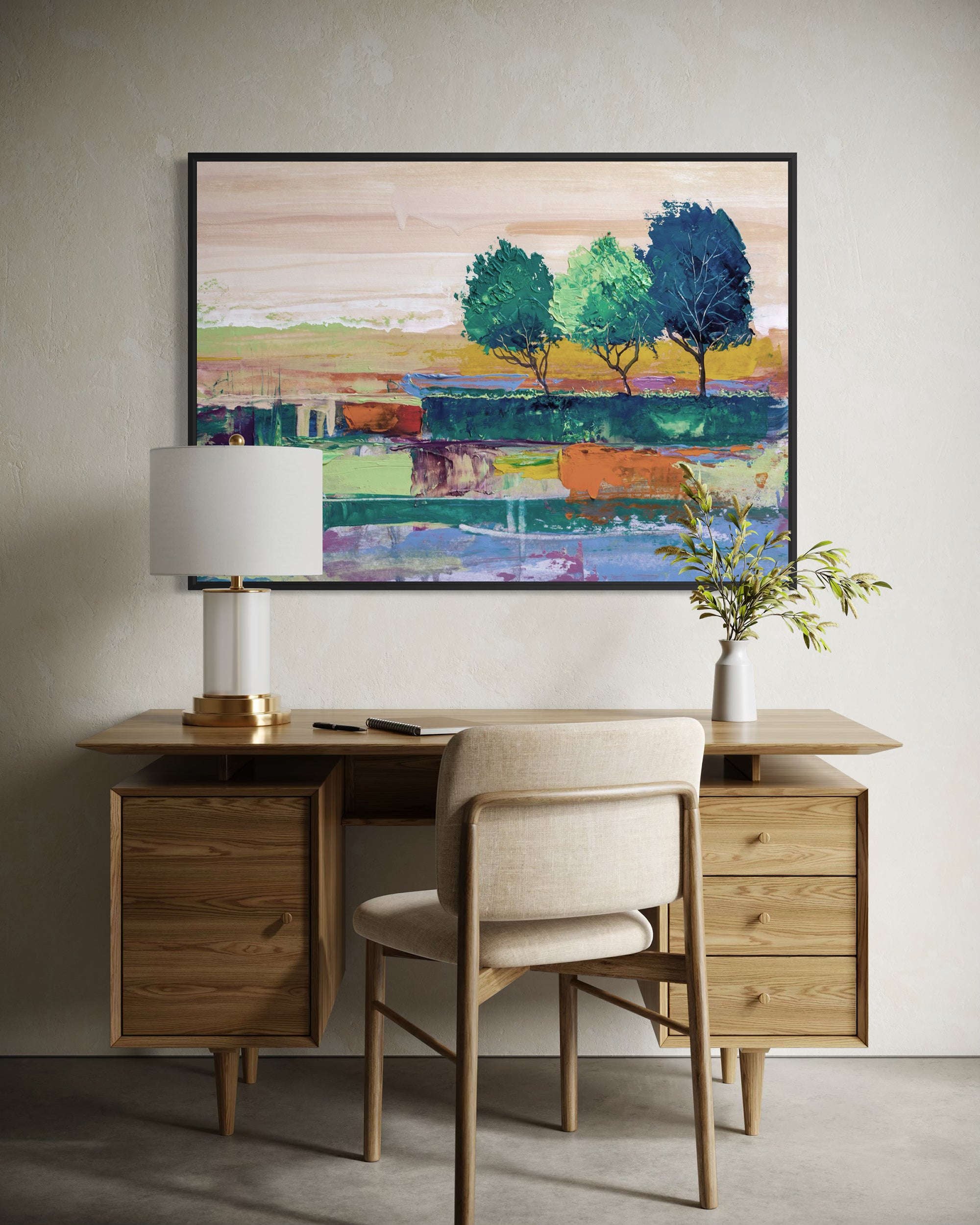 Wooden desk with chair, lamp, and abstract painting on wall