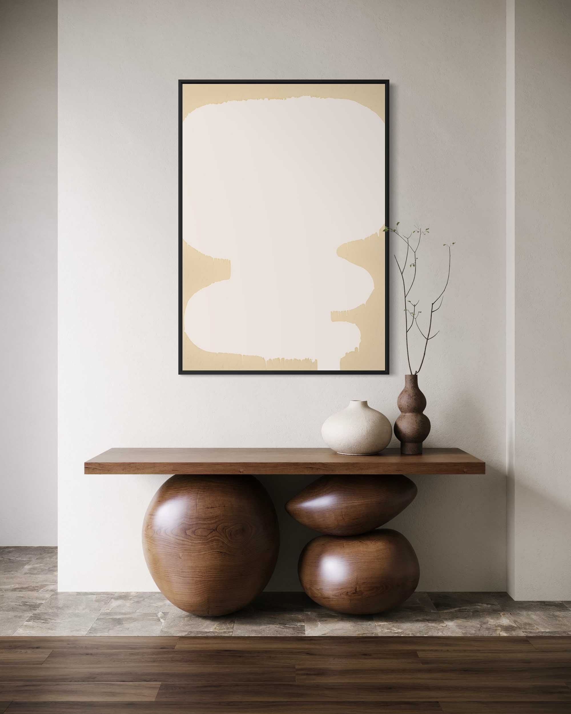 Modern interior with a wooden console table, abstract art, and decorative items.