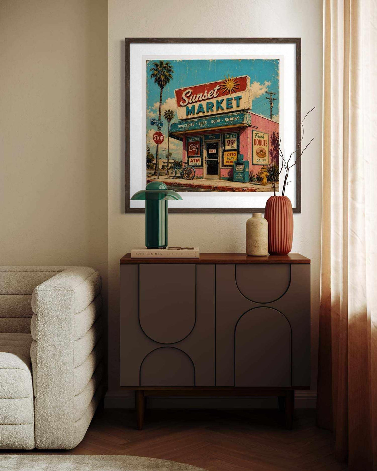 A framed art print depicting a retro 'Sunset Market' scene, styled in a modern living room setting above a dark brown sideboard cabinet.