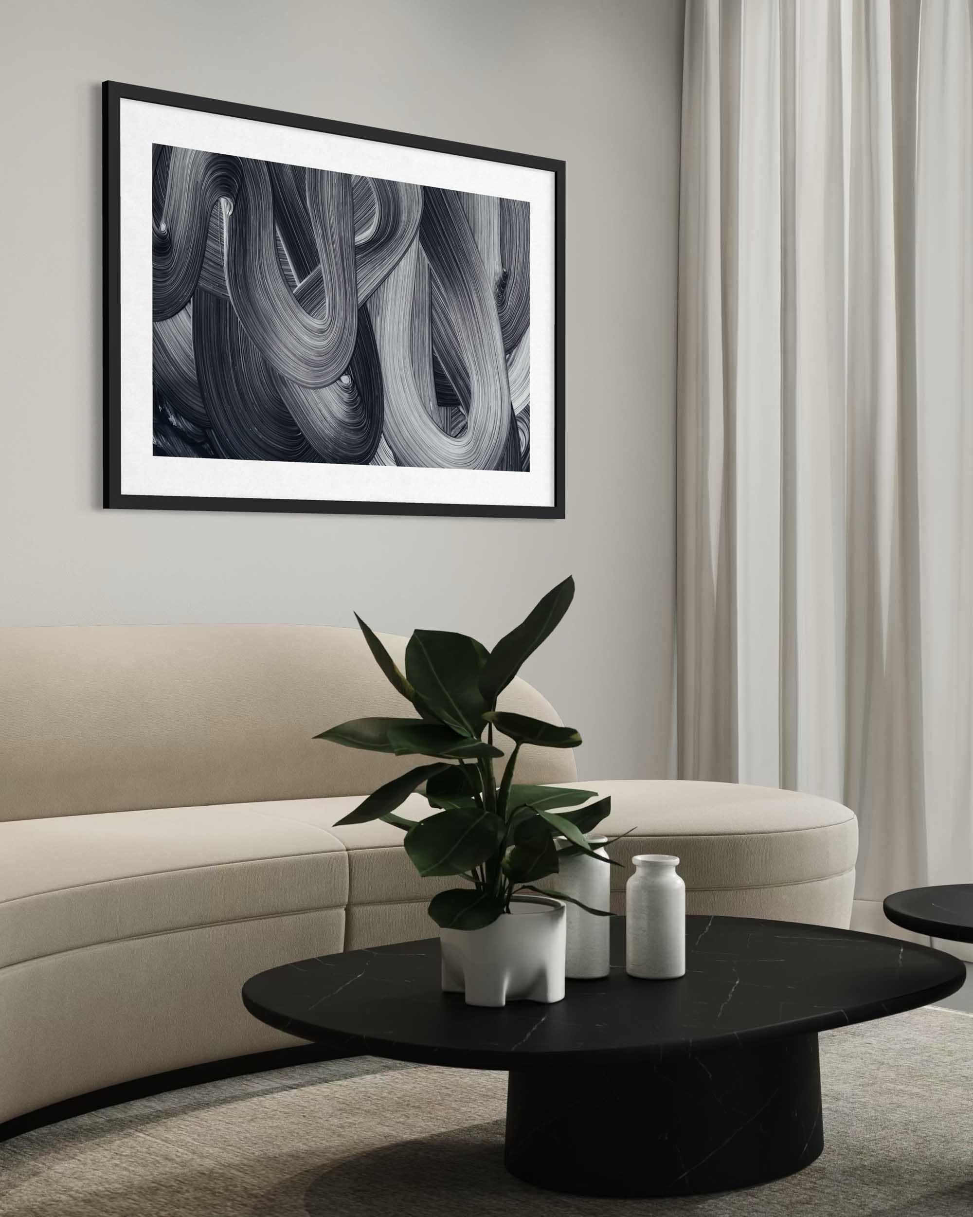 Modern living room with abstract art, sofa, and coffee table.