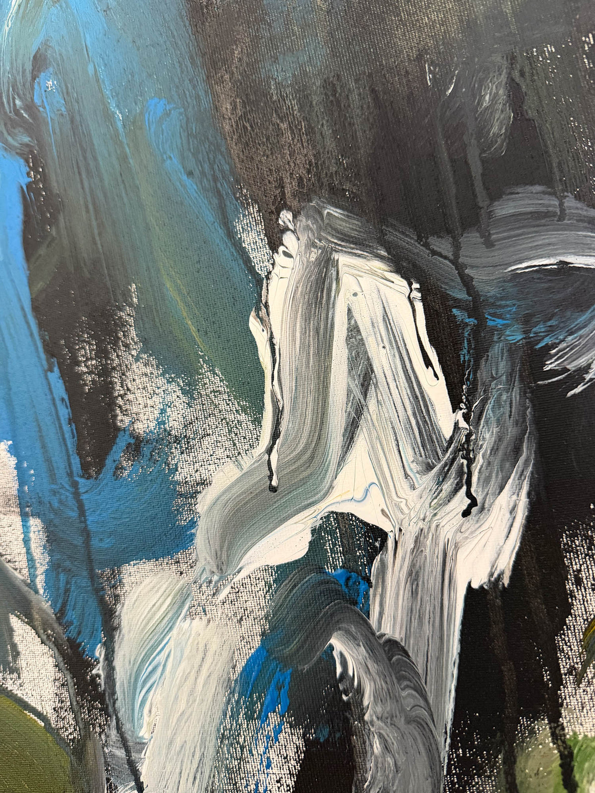 Abstract painting with expressive brushstrokes in black, white, blue, and gray, featuring layered textures and organic flowing forms.