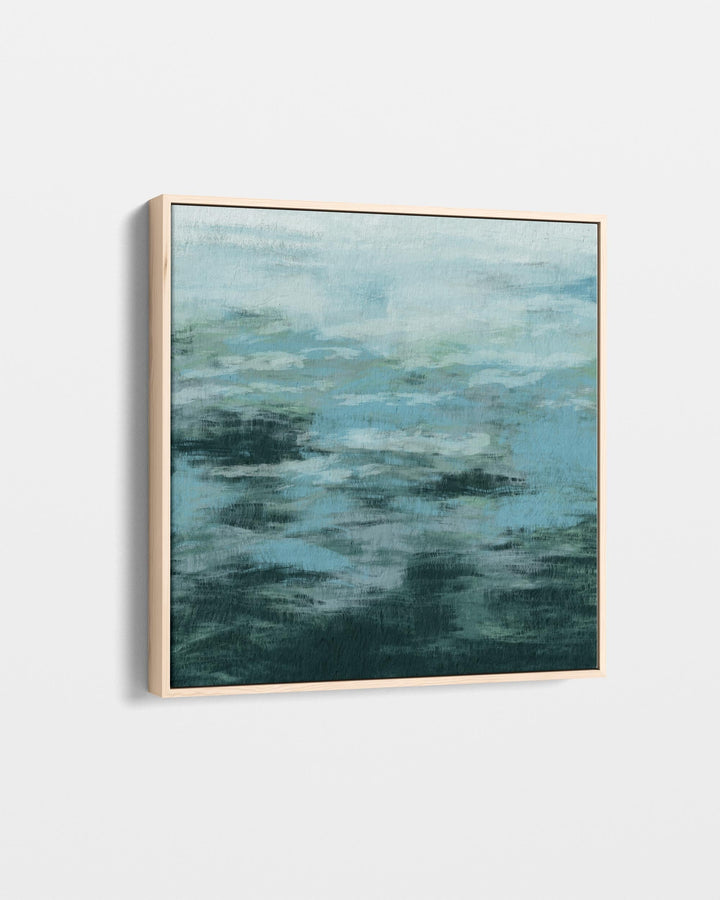 Framed abstract artwork with blue and green hues on a white background