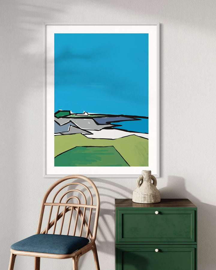 Framed abstract art piece on a wall with a chair and green cabinet below.