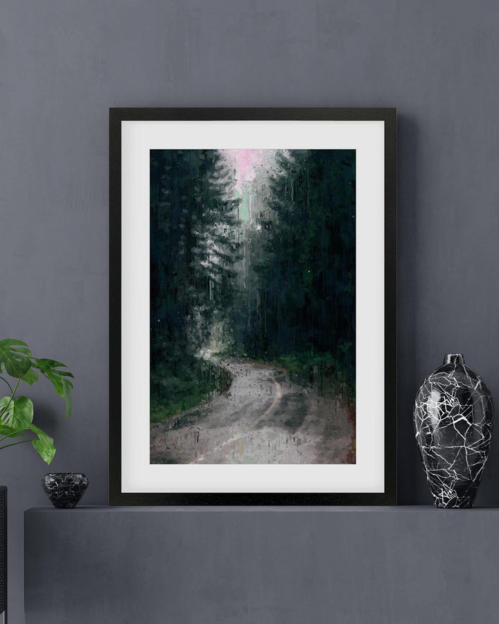 Framed artwork of a forest path on a gray wall with decorative vases.