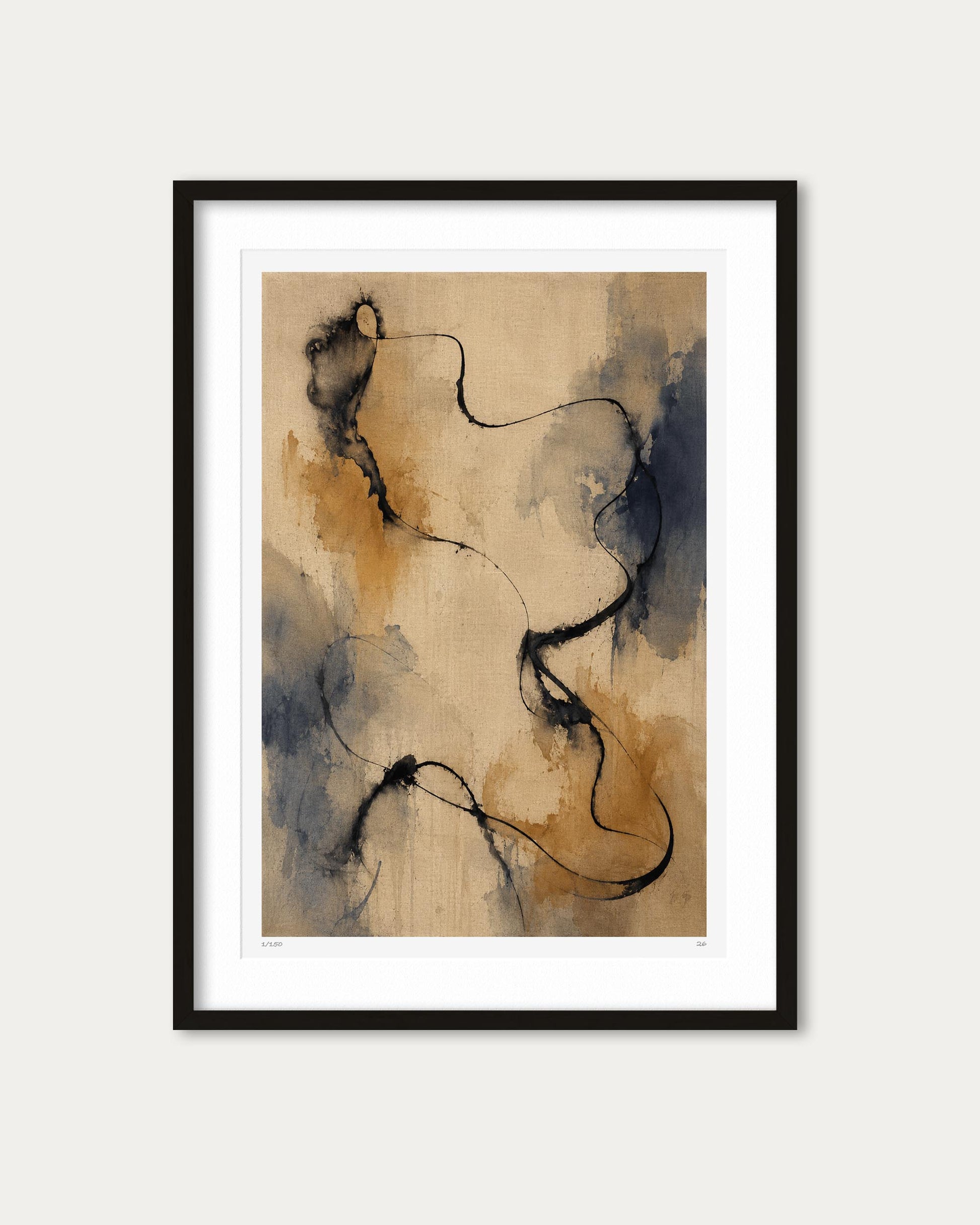 Framed abstract wall art featuring flowing black line work over a warm beige background with soft blue and tan watercolor-like washes, presented in a black frame with white mat against a light neutral wall.