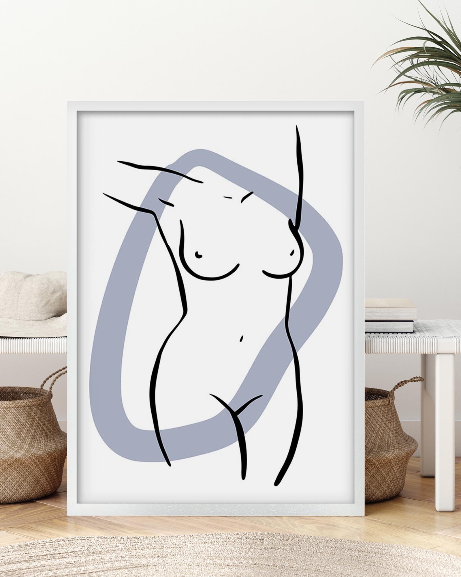 Framed abstract art print of a nude figure in a modern interior setting.