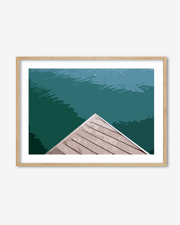 Framed artwork of a wooden dock extending into a body of water with trees on the shore.