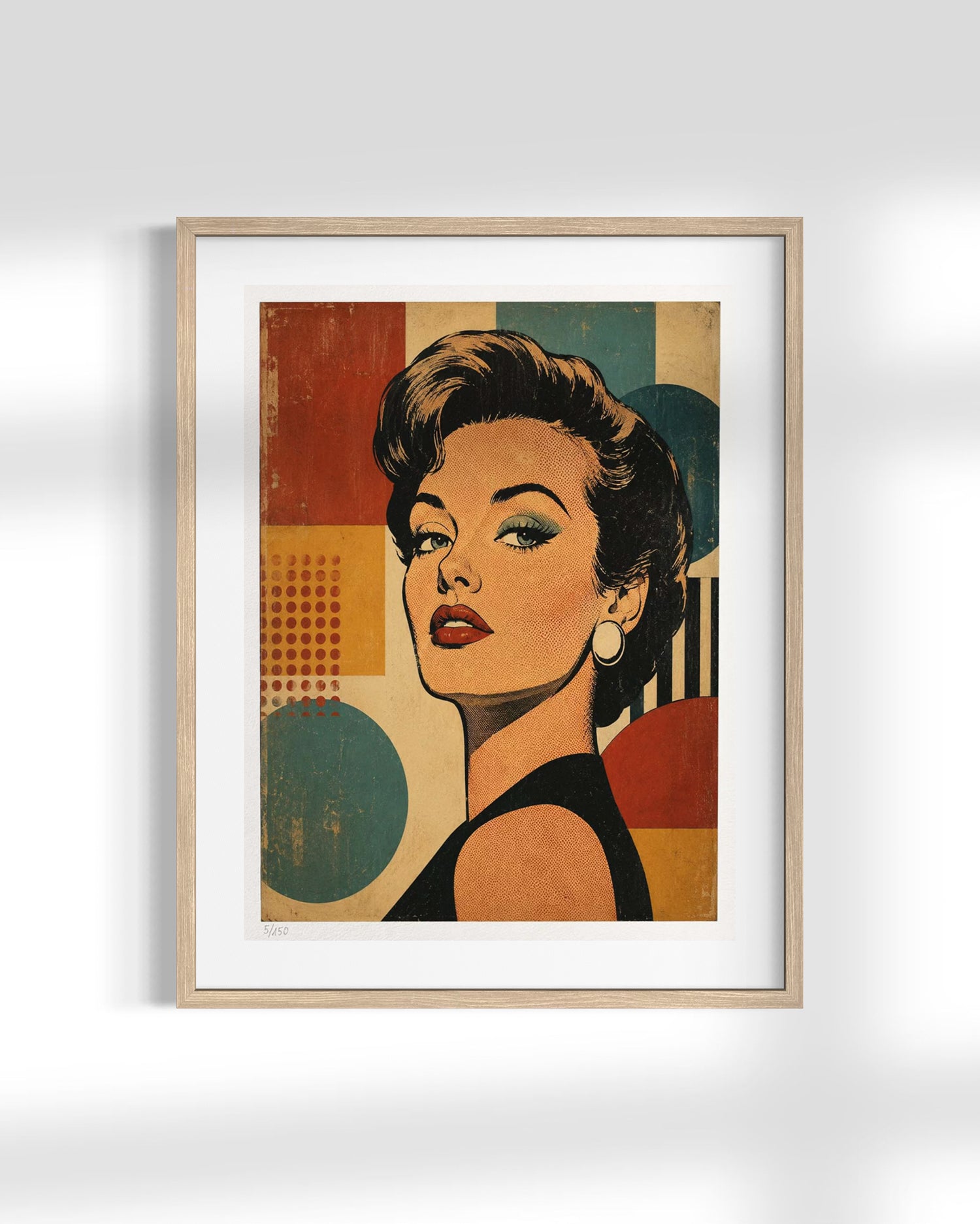 A framed art print featuring a stylized portrait of a woman with retro geometric shapes in muted red, teal, beige, and black, displayed in a light wood frame against a white wall.