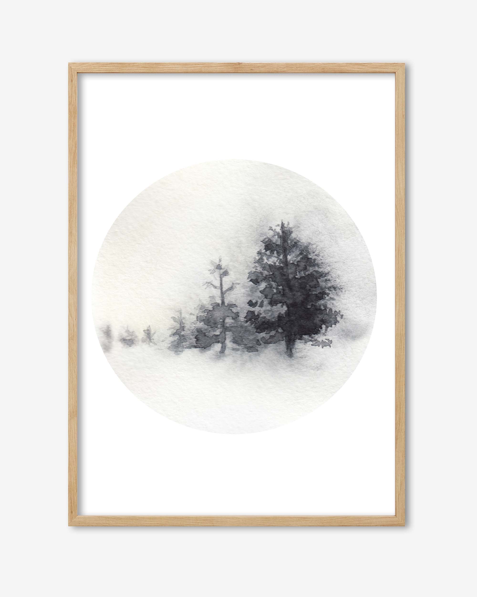 Framed artwork of trees on a snowy background