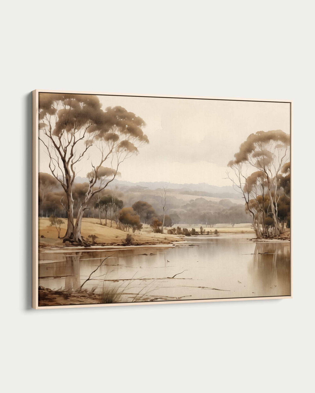 Framed artwork of a landscape with trees and a lake on a white background