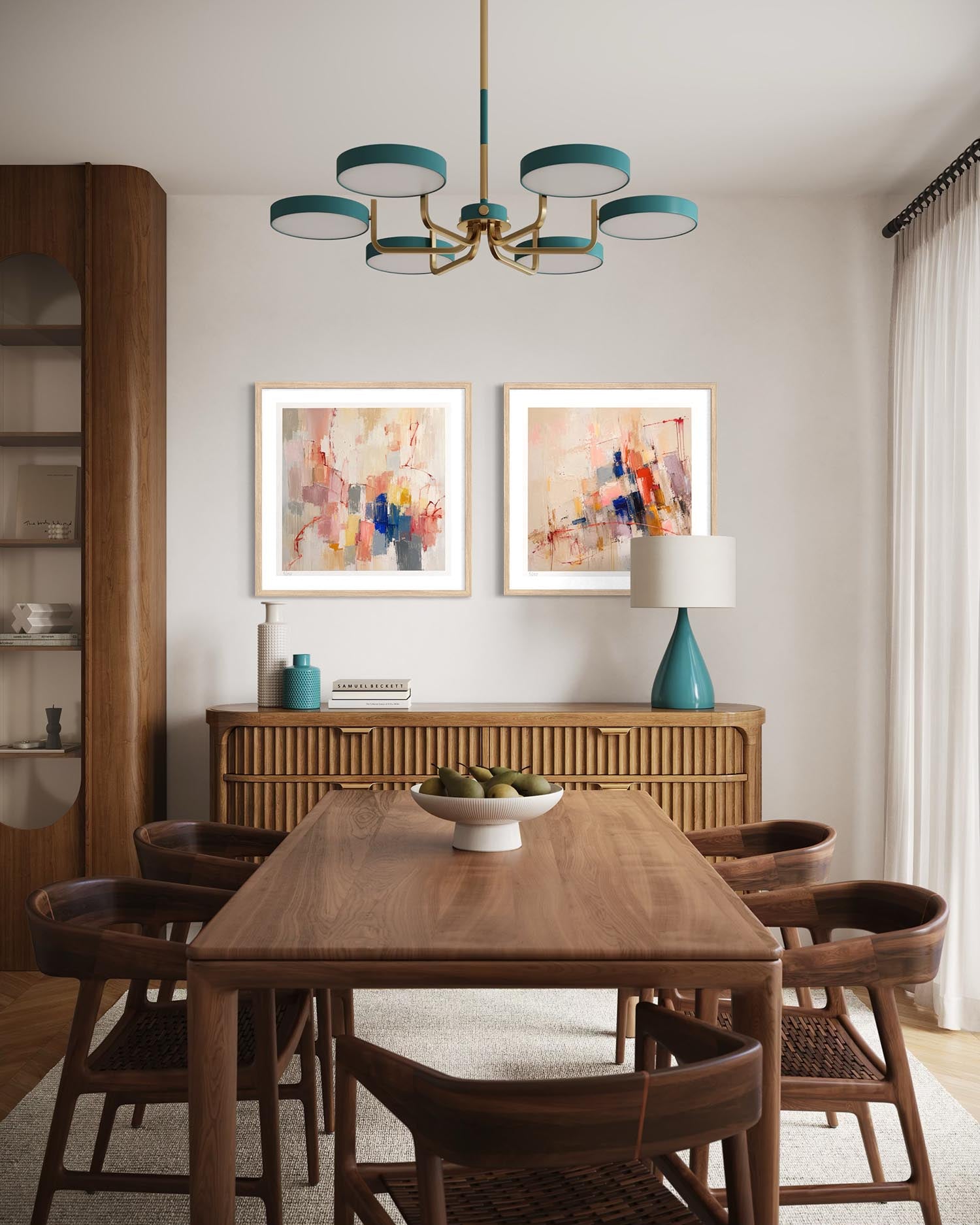 A styled dining room featuring a wooden dining table and chairs, a matching wooden sideboard with a teal lamp, and two abstract paintings on the wall.
