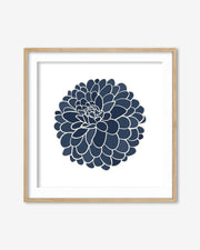 Framed artwork with a navy blue floral design on a white background