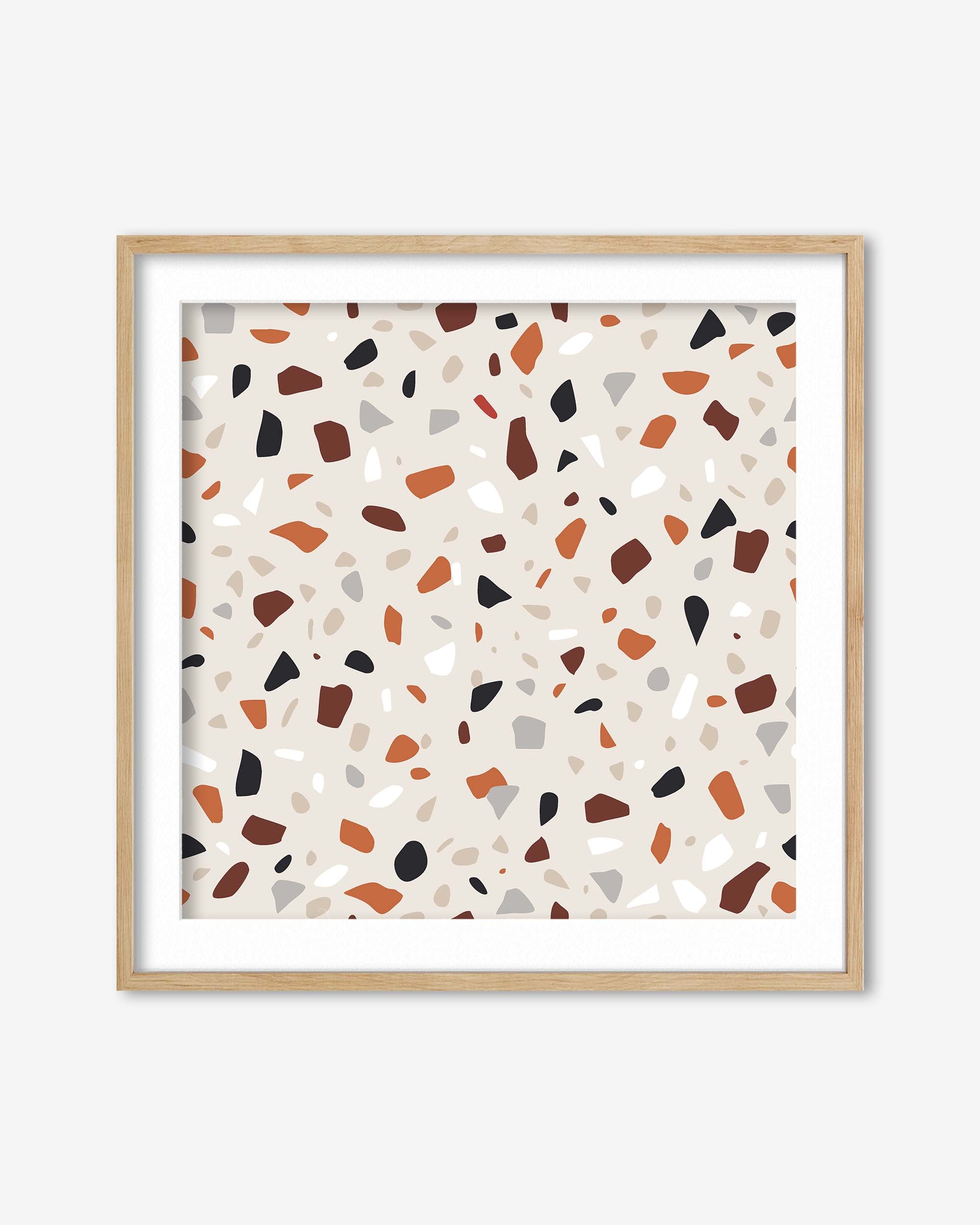 Framed artwork with a terrazzo pattern on a white background