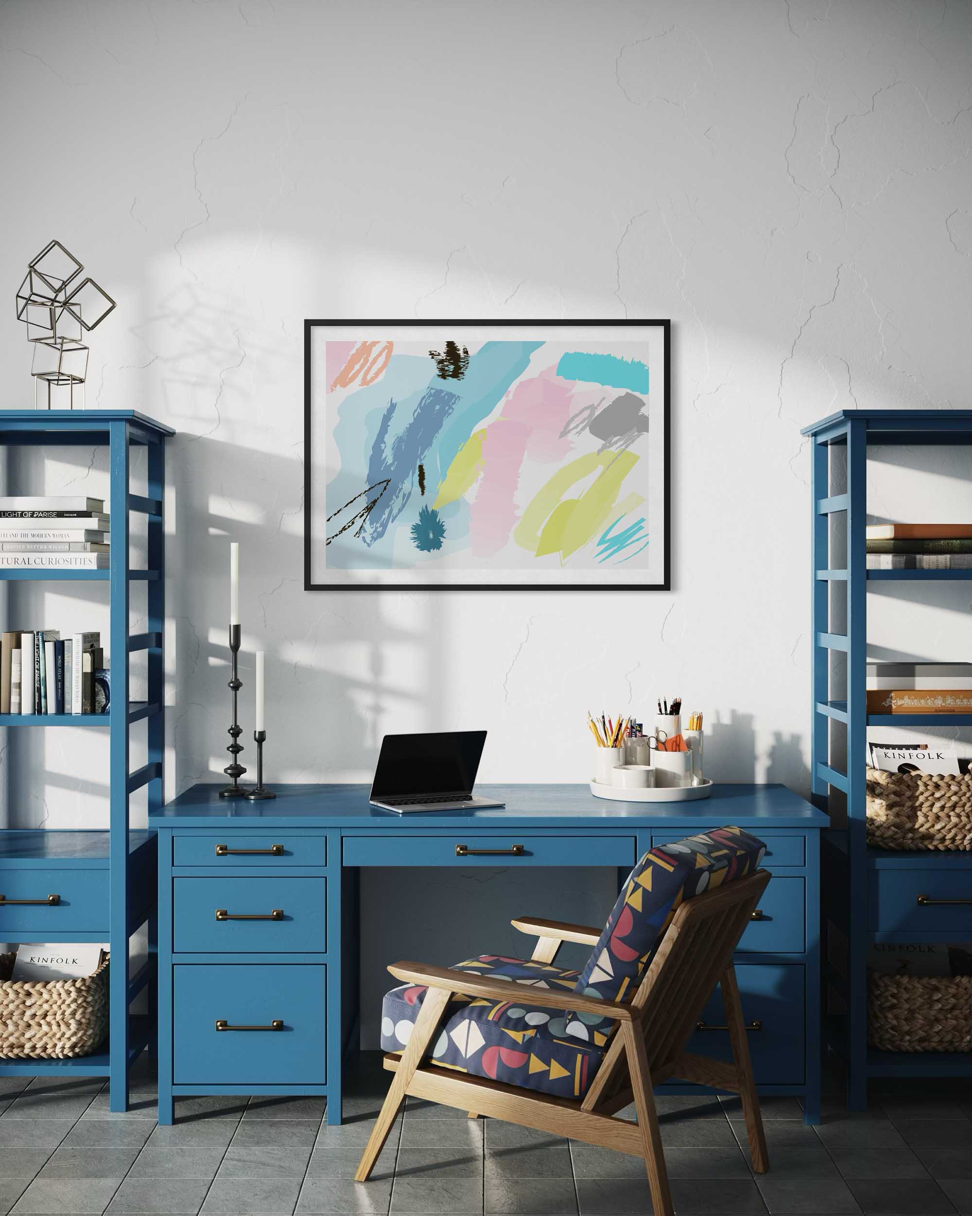 Home office with blue desk, bookshelves, and colorful abstract art on the wall.