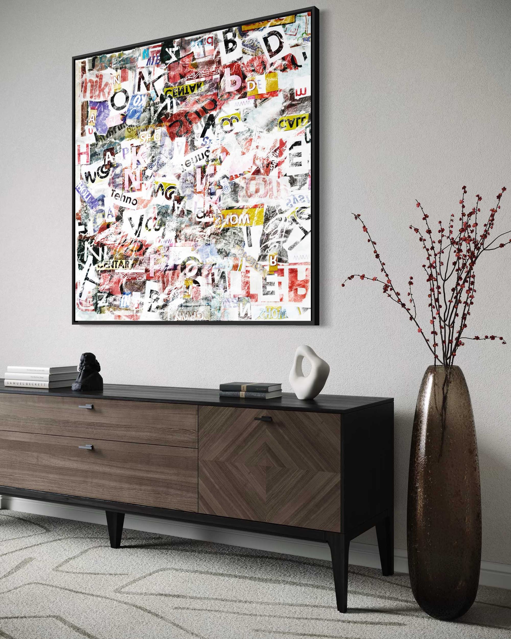Modern living room with a wooden console table, decorative vase, and framed collage art.