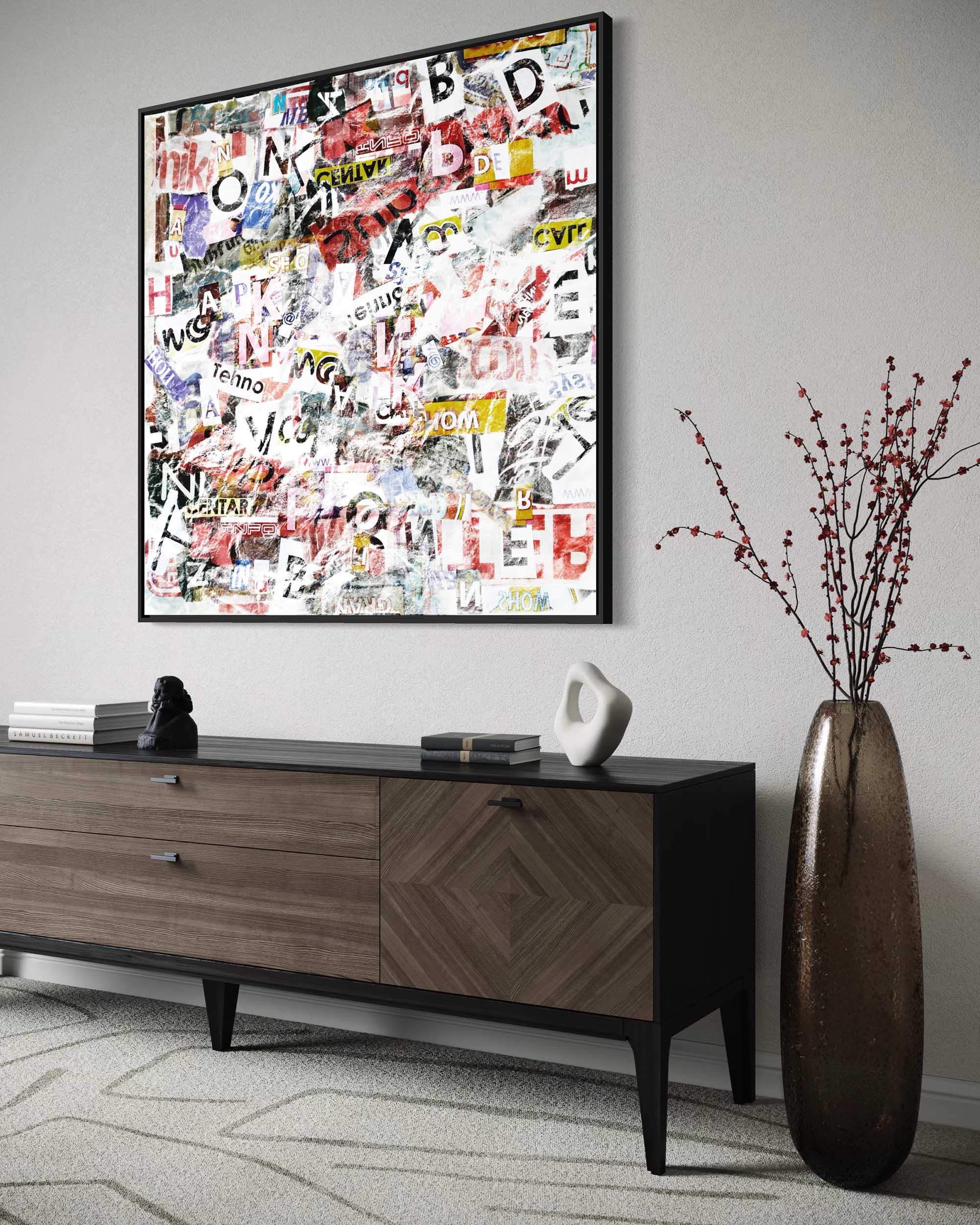 Modern living room with a wooden console table, decorative vase, and framed collage art.