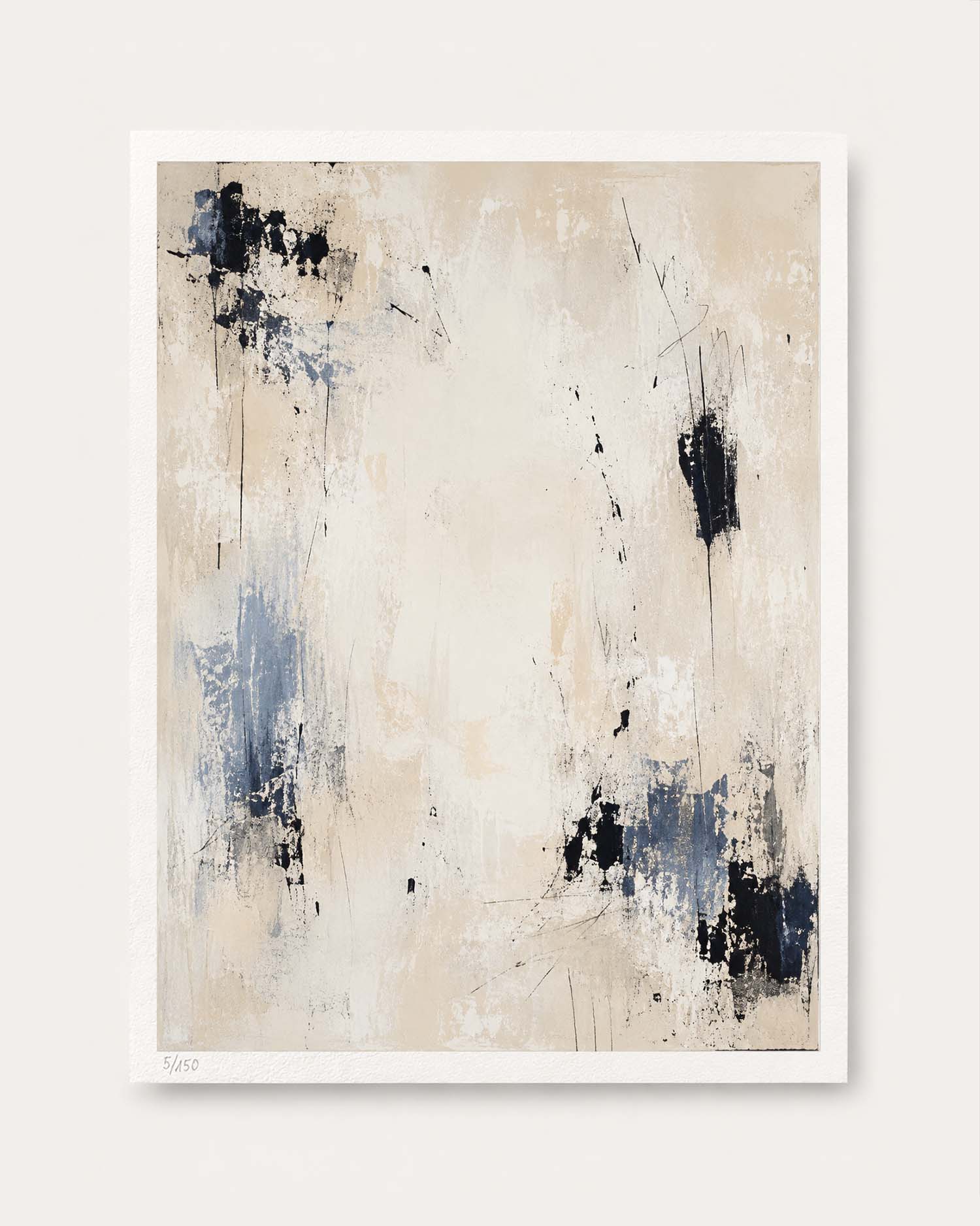 An abstract art print featuring a textured cream and beige background with blue-gray and black paint splatters, presented with a white border on a light beige background.