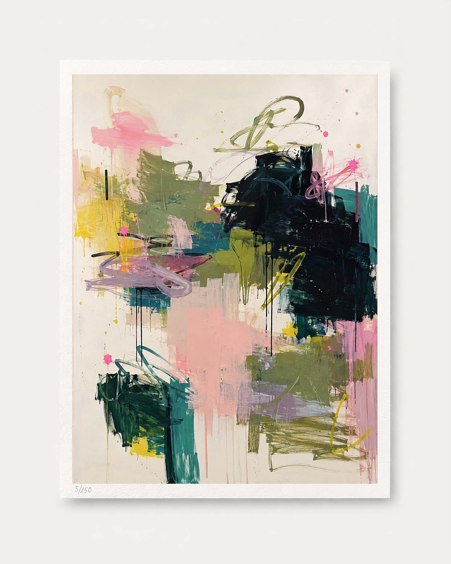 An abstract art print featuring expressive paint strokes in black, pink, green, yellow, and purple on a cream background, presented with a white border against a light gray wall.