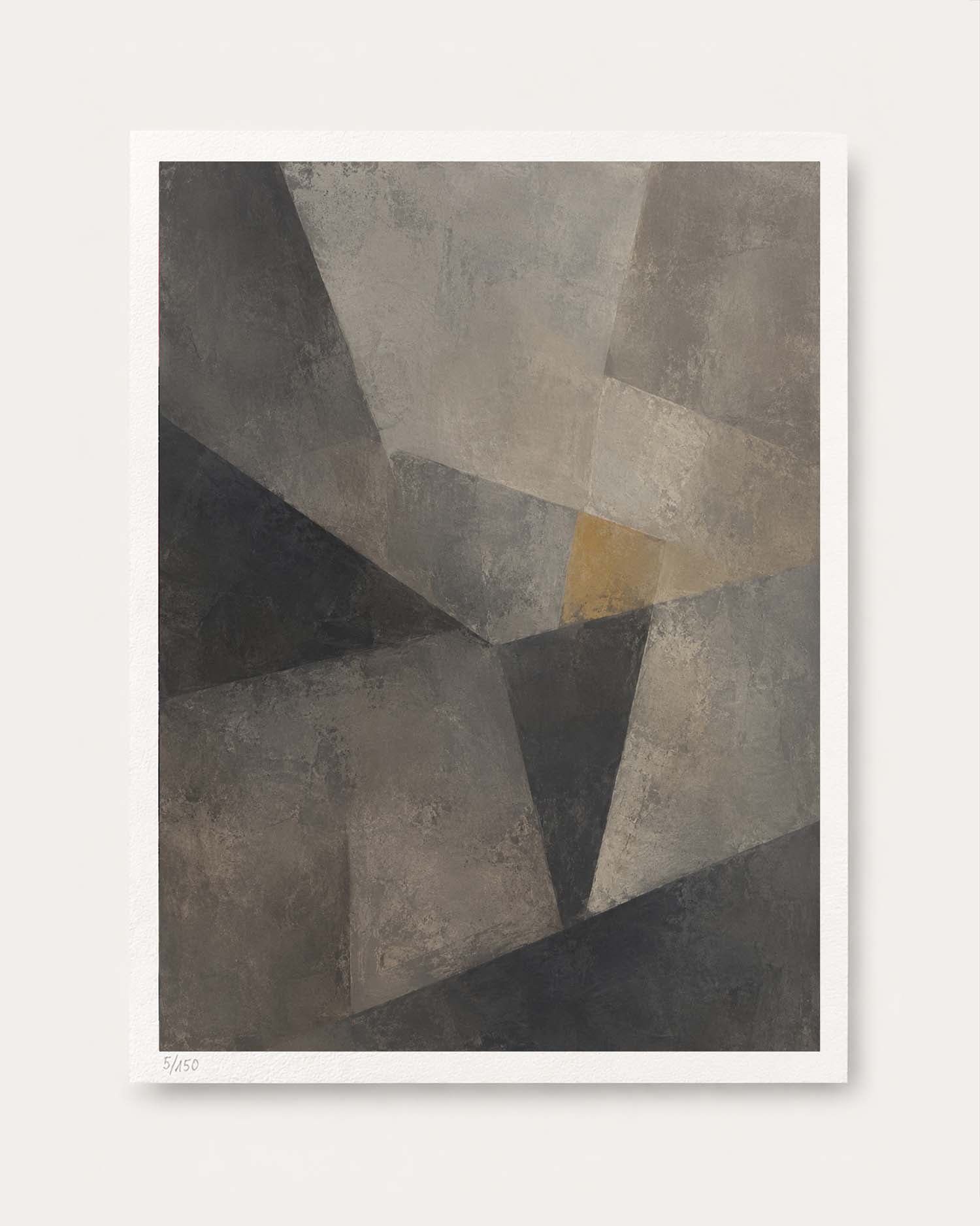 An abstract geometric art print featuring textured gray, charcoal, and black polygonal shapes with a small warm gold accent, presented on a clean off-white background.