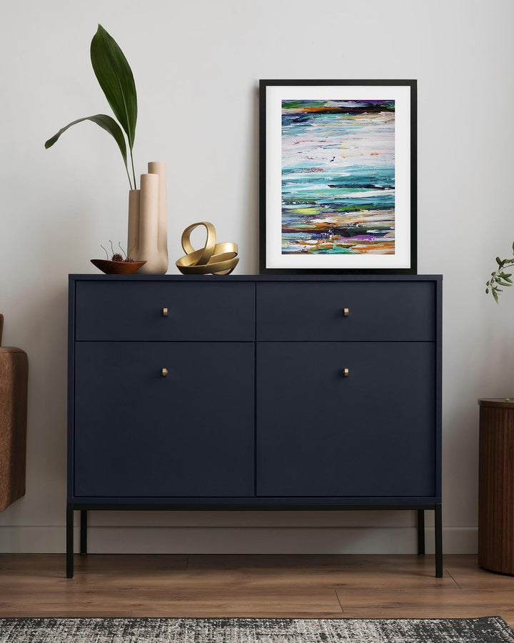 framed seascape abstract print on sideboard