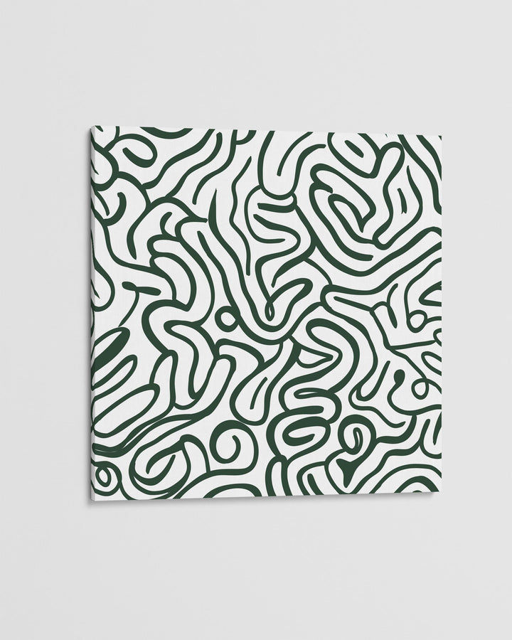 Patterned fabric with green abstract design on a light gray background