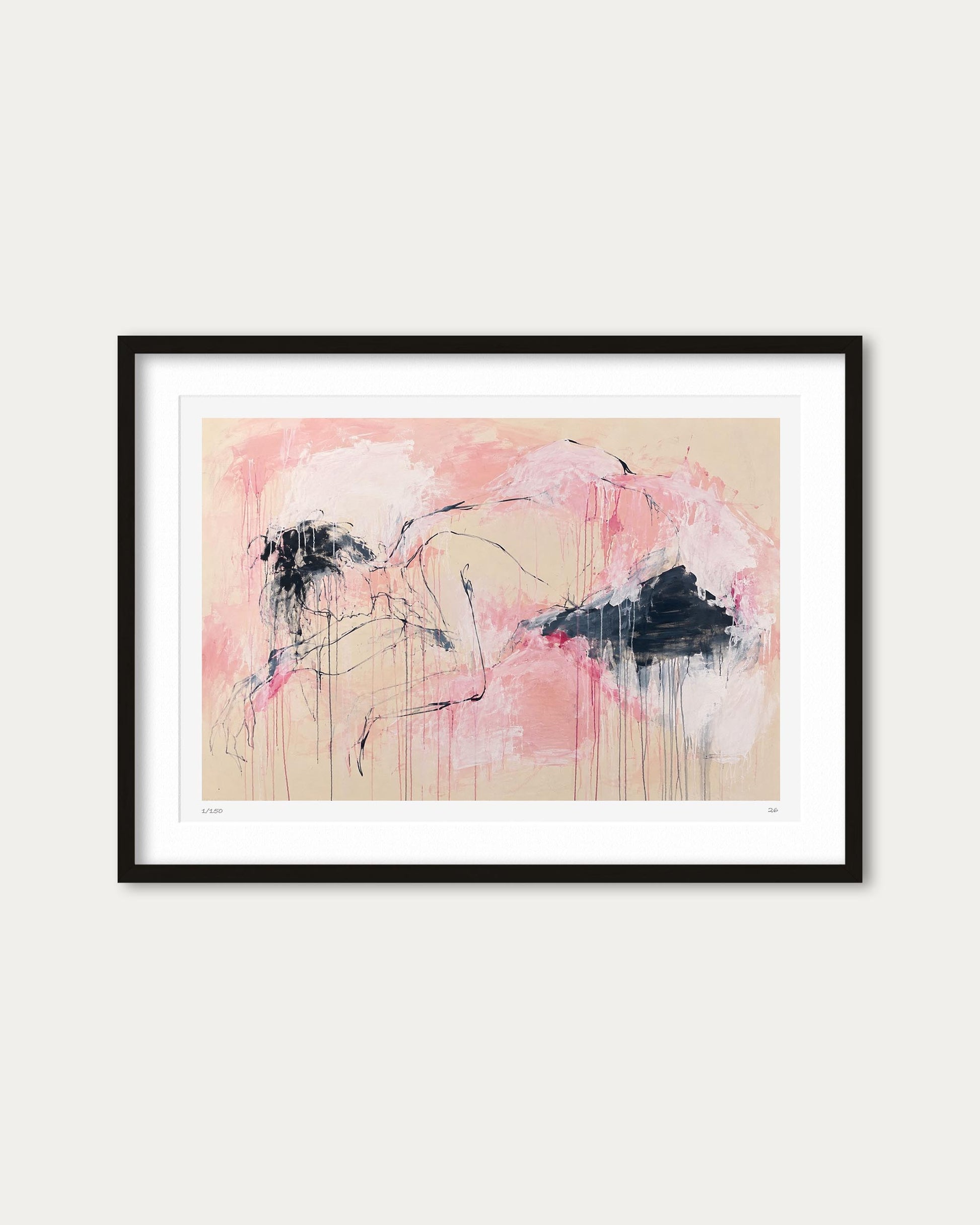 Framed abstract art print featuring pink and beige tones with black gestural brushstrokes, presented in a black frame with white matting against a light gray wall.