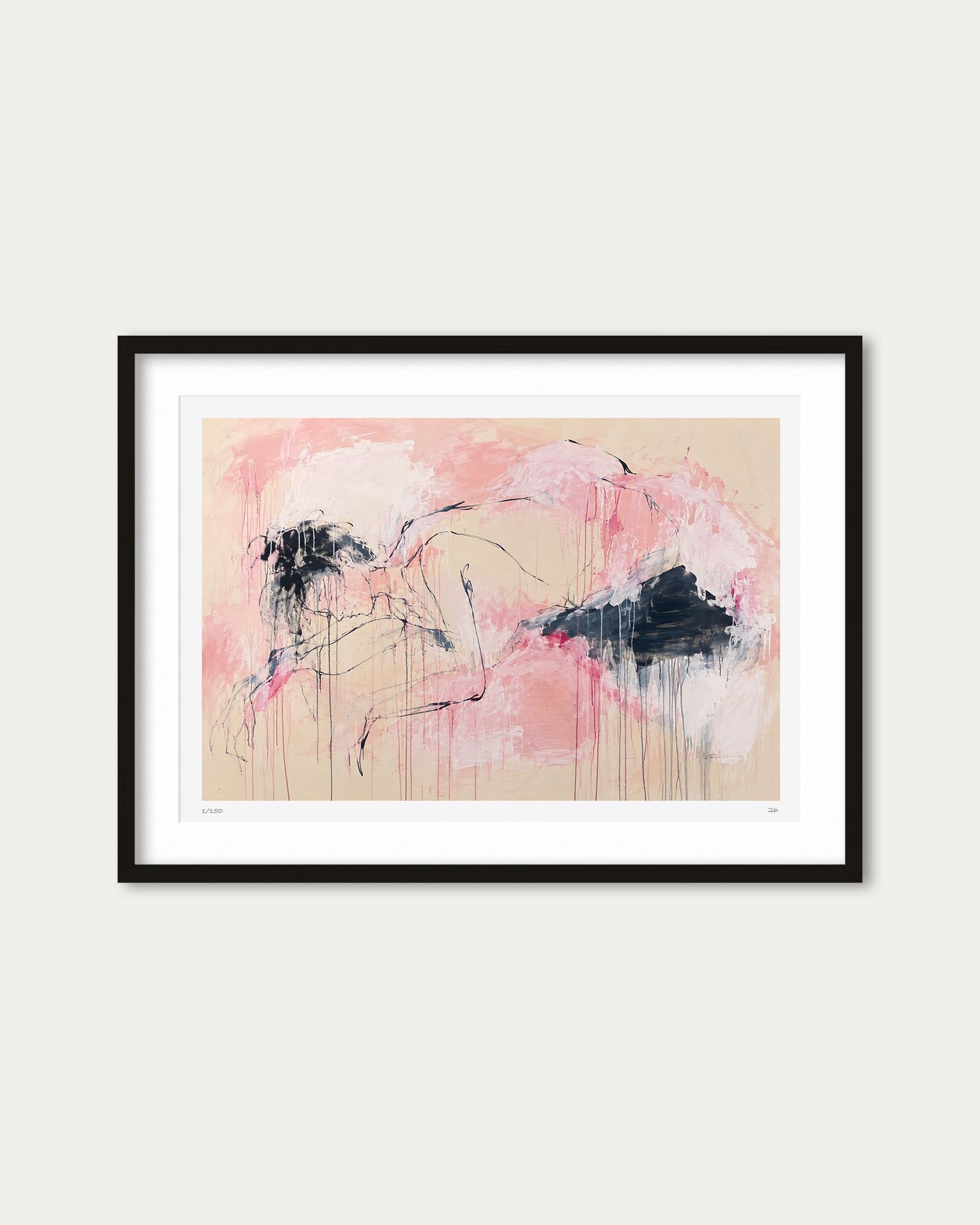 Framed abstract art print featuring pink and beige tones with black gestural brushstrokes, presented in a black frame with white matting against a light gray wall.