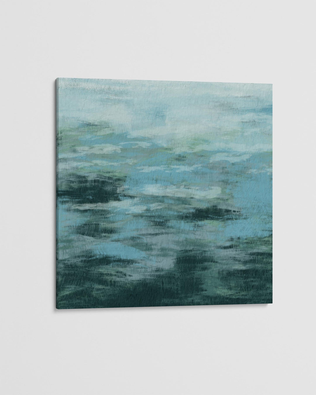 Abstract painting with blue and green hues on a light gray background