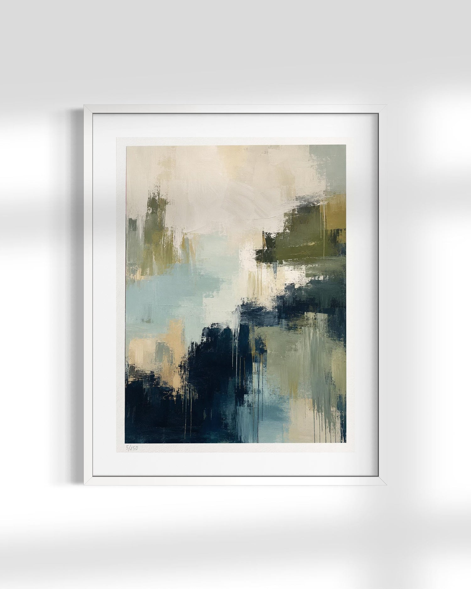 A framed abstract art print featuring textured brushstrokes in navy blue, teal, olive green, and cream, presented in a white frame against a light gray wall with soft shadows.