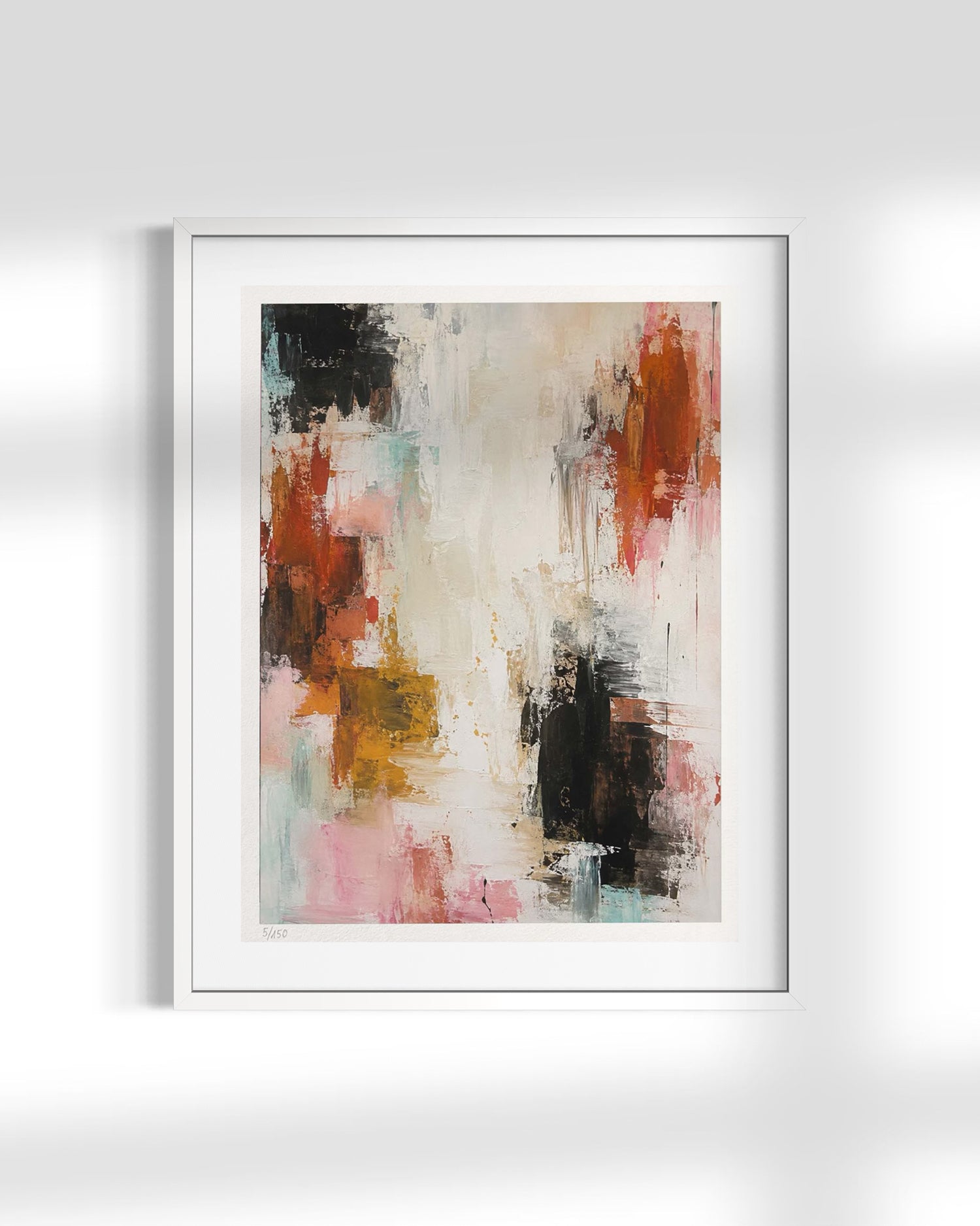 Framed abstract wall art featuring expressive brushstrokes in black, rust red, pink, mustard yellow, and pale blue on a white mat and white frame, displayed against a light gray wall with soft shadows.