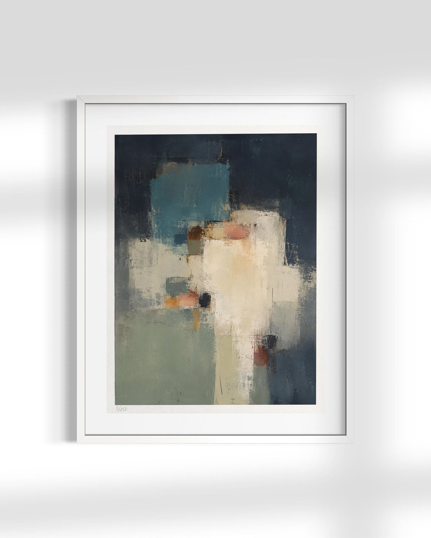 A framed abstract art print featuring a modern composition of dark navy, teal, cream, and sage green blocks, presented in a white frame against a light gray wall with soft shadows.